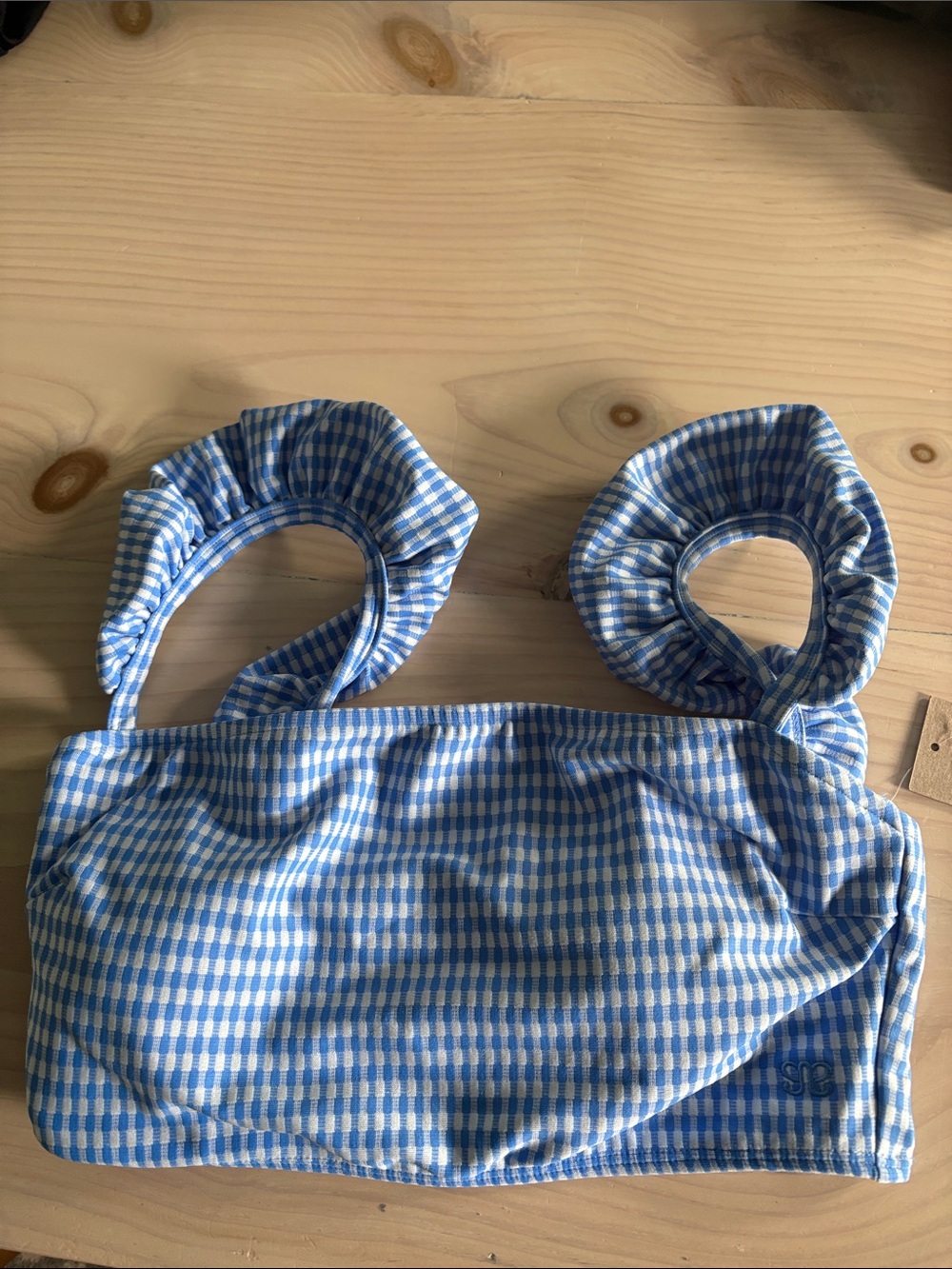 Albion Women’s bikini top. Blue and white gingham with ruffled strap